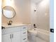 Bathroom with marble tile shower, toilet, and single sink vanity at 3042 Herold Dr, Orlando, FL 32805