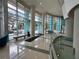 Spacious lobby with a water feature, large windows, and modern architecture at 322 E Central Blvd # 908, Orlando, FL 32801