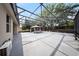 Large screened-in lanai with lots of room for activities with a gazebo at 3281 Saloman Ln, Clermont, FL 34711