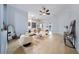 Bright and airy living room with modern furniture, neutral tones, and an open concept design at 3281 Saloman Ln, Clermont, FL 34711