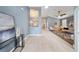 Bright and airy living room with modern furniture, neutral tones, and an open concept design at 3281 Saloman Ln, Clermont, FL 34711