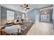 Inviting living room featuring a comfortable seating area, natural light, and modern decor at 3281 Saloman Ln, Clermont, FL 34711