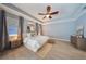 Comfortable main bedroom featuring a ceiling fan, and a calming neutral color palette at 3281 Saloman Ln, Clermont, FL 34711