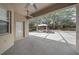 Screened patio with concrete flooring, a ceiling fan, and view of a gazebo at 3281 Saloman Ln, Clermont, FL 34711