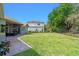 Expansive backyard space with a concrete patio and ample room for recreation at 3317 Oakmont Ter, Longwood, FL 32779