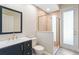 The bathroom features a vanity, toilet, tiled walk-in shower, and light colored tile flooring at 3317 Oakmont Ter, Longwood, FL 32779