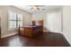 Bedroom with dark floors, ceiling fan, bright window and closet at 3317 Oakmont Ter, Longwood, FL 32779