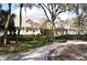 Attractive community center surrounded by lush greenery and a winding sidewalk at 3317 Oakmont Ter, Longwood, FL 32779