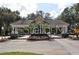 Charming community entrance with meticulously landscaped flower beds at 3317 Oakmont Ter, Longwood, FL 32779