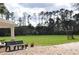 Large community field featuring a covered picnic area and an athletic net at 3317 Oakmont Ter, Longwood, FL 32779