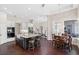 Open concept kitchen with a center island connecting to a breakfast nook and dining area at 3317 Oakmont Ter, Longwood, FL 32779