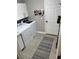 Functional laundry room with modern washer and dryer, maximizing convenience at 3317 Oakmont Ter, Longwood, FL 32779