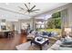 Bright living room with large windows providing natural light and backyard views at 3317 Oakmont Ter, Longwood, FL 32779