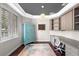 Bright, private office space with custom built-ins, large windows, and hardwood floors at 3317 Oakmont Ter, Longwood, FL 32779