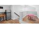Bright playroom featuring a staircase and play table at 34 Jackson Cir, Winter Springs, FL 32708