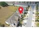 An aerial view of the homes in the community and the surrounding neighborhood at 3661 Brighton Park Cir, Orlando, FL 32812