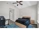 Bedroom with vaulted ceilings, light gray walls, wood-look flooring, and a ceiling fan at 3661 Brighton Park Cir, Orlando, FL 32812