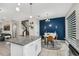 Modern kitchen with granite countertops, stainless steel appliances, and breakfast area at 3661 Brighton Park Cir, Orlando, FL 32812