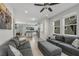 Open-concept living space with a view of the kitchen and plenty of room for entertaining at 3661 Brighton Park Cir, Orlando, FL 32812