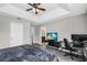 Main bedroom features a ceiling fan and an en suite bathroom at 3661 Brighton Park Cir, Orlando, FL 32812