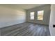 Empty bedroom featuring neutral paint, recessed lighting, and two windows allowing natural light at 4634 Sw 170Th Road, Ocala, FL 34473