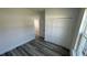 Bright bedroom with window and closet for optimal storage at 4634 Sw 170Th Road, Ocala, FL 34473