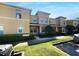 Well-maintained two-story building with inviting entrance and manicured landscaping and plenty of parking at 5413 River Rock Rd, Lakeland, FL 33809
