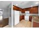 Functional kitchen equipped with white appliances, ample cabinet space, and tile flooring at 5413 River Rock Rd, Lakeland, FL 33809