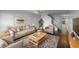 Bright living room featuring modern decor, comfortable seating, and neutral tones at 5413 River Rock Rd, Lakeland, FL 33809