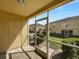 Relaxing screened-in patio with a view of the backyard, offering a tranquil spot to enjoy the outdoors at 5413 River Rock Rd, Lakeland, FL 33809