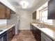 Updated kitchen with stainless steel appliances, ample cabinet space, and modern countertops at 6740 Se 107Th St, Belleview, FL 34420