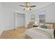 Comfortable bedroom with closet, and soft natural lighting at 7606 Fordham Creek Ln, Orlando, FL 32818