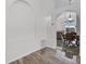 Dining room featuring arched doorway and tile flooring at 7606 Fordham Creek Ln, Orlando, FL 32818