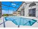 Inviting screened-in pool area with patio furniture and a view at 7606 Fordham Creek Ln, Orlando, FL 32818