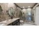 Stylish bathroom featuring dual sinks, a large walk-in shower, and contemporary fixtures at 828 Gisele Ct, Haines City, FL 33844