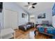 bedroom featuring two beds, ceiling fan, and closet at 838 Kildrummy Dr, Davenport, FL 33896
