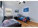 bedroom featuring two beds, ceiling fan, and closet at 838 Kildrummy Dr, Davenport, FL 33896