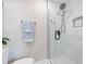 Modern bathroom showcasing a sleek glass shower with a marble tiled wall at 843 W Swoope Ave, Winter Park, FL 32789