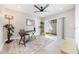 Bright home office with sliding glass doors to the outside area at 843 W Swoope Ave, Winter Park, FL 32789