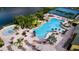 Aerial view of the community pool, tennis courts, and recreation area at 8971 California Palm Rd, Kissimmee, FL 34747