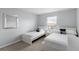 Light-filled bedroom with two twin beds, perfect for a shared space or guest room at 8971 California Palm Rd, Kissimmee, FL 34747