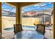 Relaxing patio space with a splash pool, seating area, and screened enclosure at 8971 California Palm Rd, Kissimmee, FL 34747