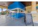 Poolside bar with seating, a wide selection of drinks and eats, and a lively atmosphere at 8971 California Palm Rd, Kissimmee, FL 34747
