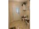 Inviting entryway featuring tiled floor, seating, and storage cabinet at 117 Darlene Ct, Davenport, FL 33897
