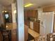 Bright kitchen features granite counters, an island with seating, and stainless steel appliances at 117 Darlene Ct, Davenport, FL 33897