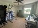 Bedroom with musical instruments and exercise equipment, with lots of natural light at 12015 Se 72Nd Court Rd, Belleview, FL 34420