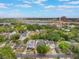 Aerial view with the property outlined in red, showing proximity to a lake and city at 1209 Gunnison Ave, Orlando, FL 32804