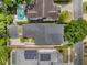 Aerial view of property, showing layout, pool, garage, and surrounding landscape at 1209 Gunnison Ave, Orlando, FL 32804