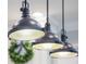 Contemporary kitchen pendant lights illuminate the space, adding warmth and style above kitchen island at 1209 Gunnison Ave, Orlando, FL 32804