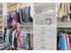 Walk-in closet offers ample storage with built-in shelving and organized hanging space at 122 Lower Lake Ct, Debary, FL 32713